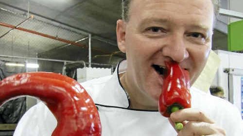 CHILLY WEATHER: Mercure Cairns Harbourside executive chef Markus Strieby hams it up at Rusty’s Markets in Cairns. CHILLY WEATHER: Mercure Cairns Harbourside executive chef Markus Strieby hams it up at Rusty’s Markets in Cairns.
